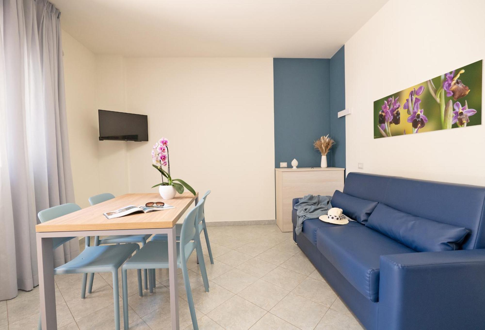 Hotel Residence Torre Del Porto Матината Стая снимка