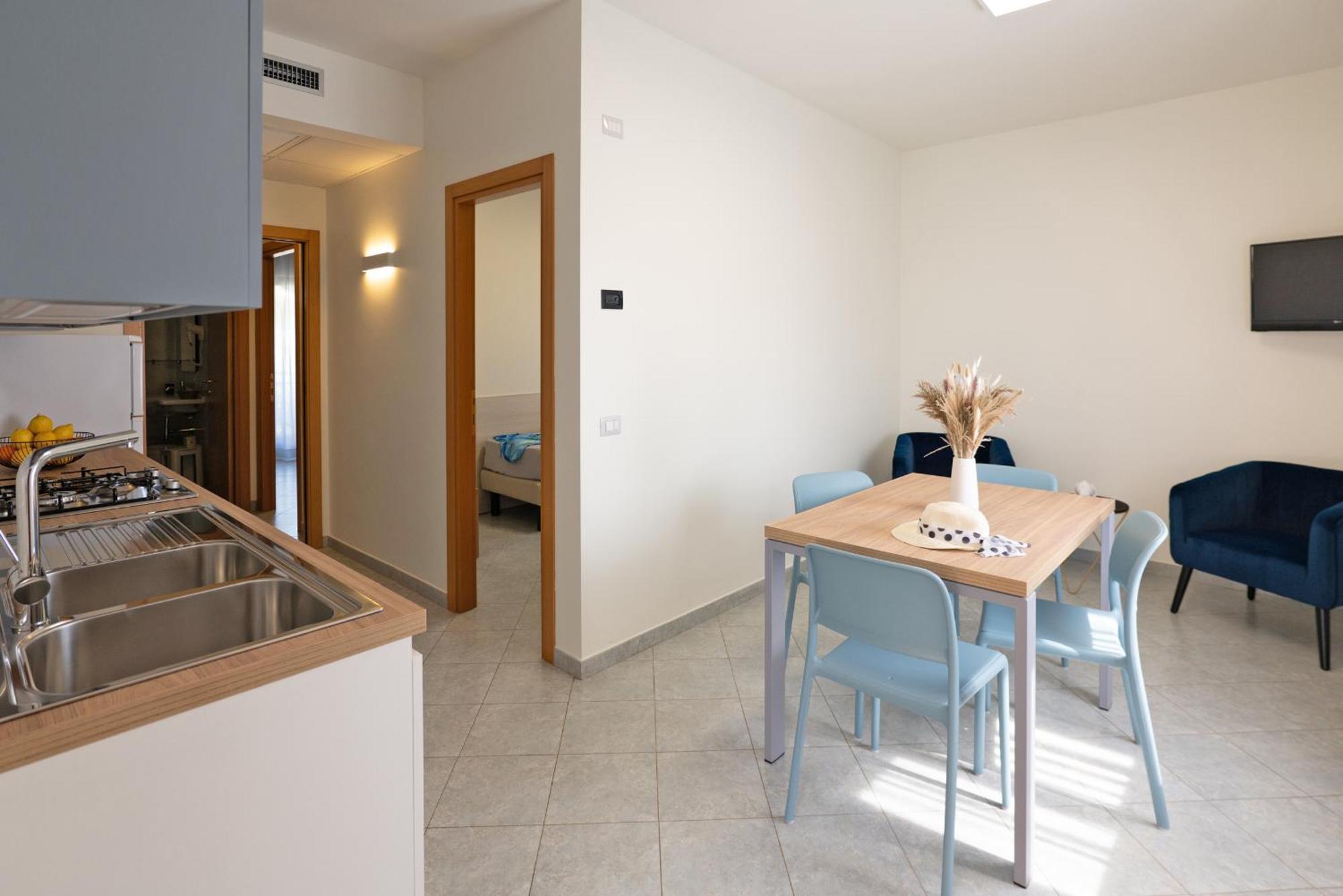 Hotel Residence Torre Del Porto Матината Стая снимка
