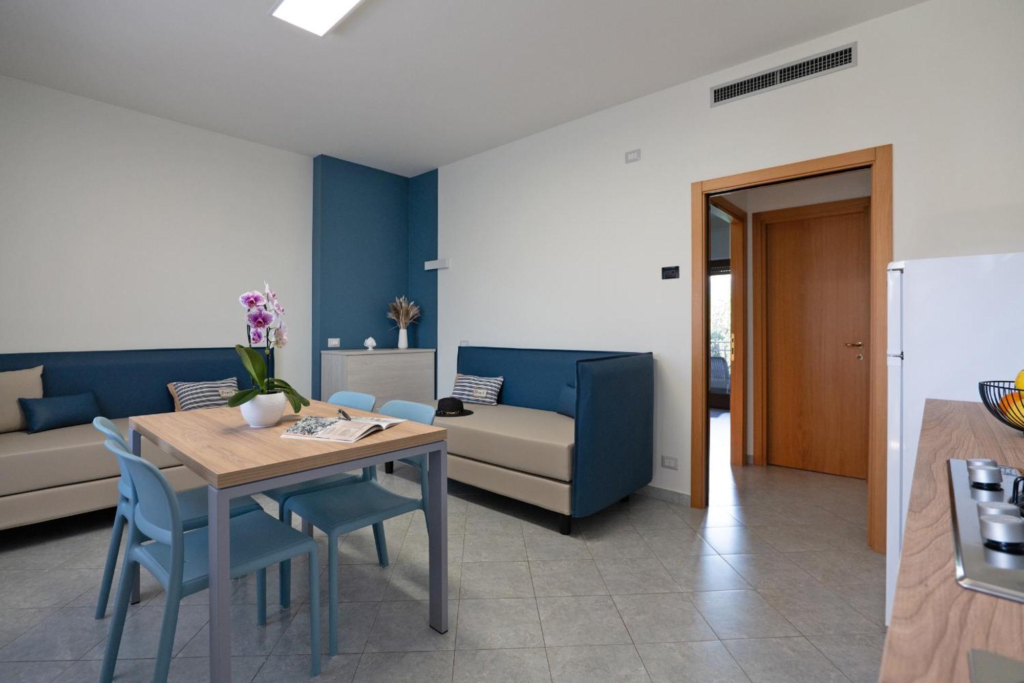Hotel Residence Torre Del Porto Матината Стая снимка